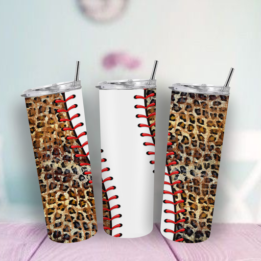 Three tumblers with leopard print and red stitching design on a light background