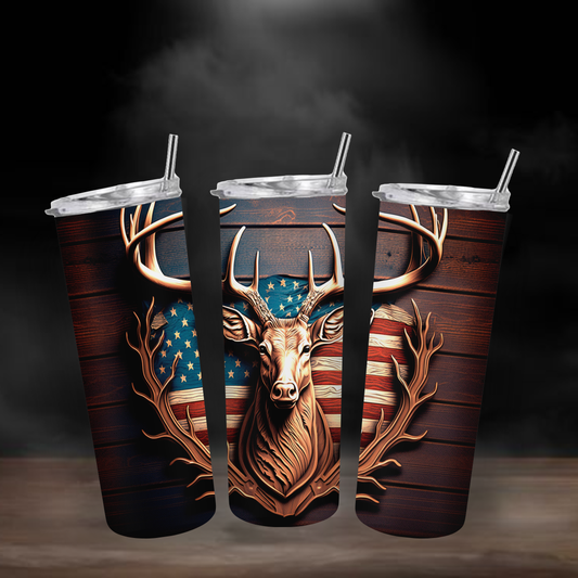 Tumbler with a deer design and American flag on a dark background
