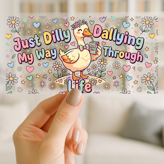 The design features a cartoon duck wearing a flower crown and bow tie, surrounded by hearts, stars, and daisies, with the text 'Just Dilly Dallying My Way Through Life'.