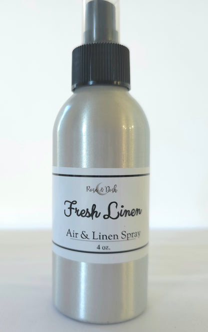 Silver air and linen spray bottle, Fresh Linen Scent, with black cap on a white background